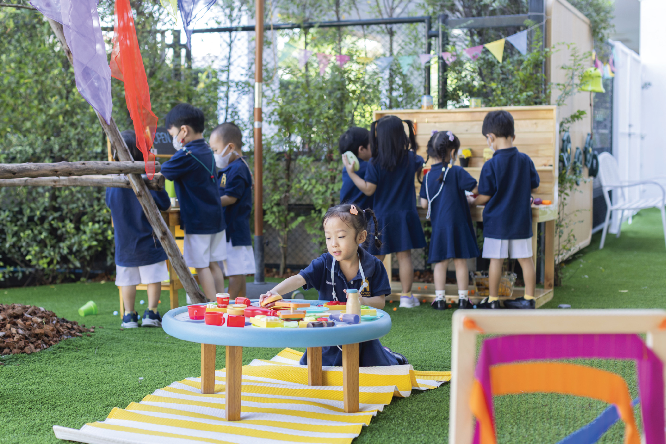 Students enjoying outdoor activities at Anvida School campus
